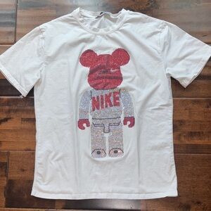 Nike White Tee with Red and Silver Bear Design